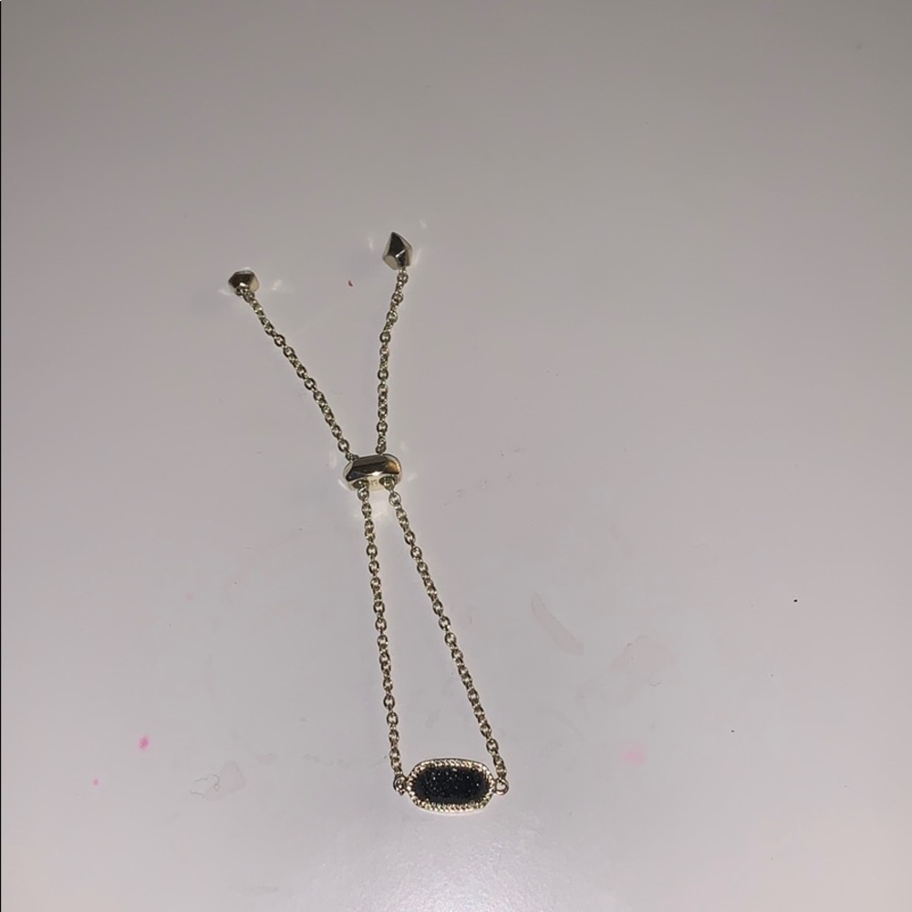 black kendra scott with gold chain